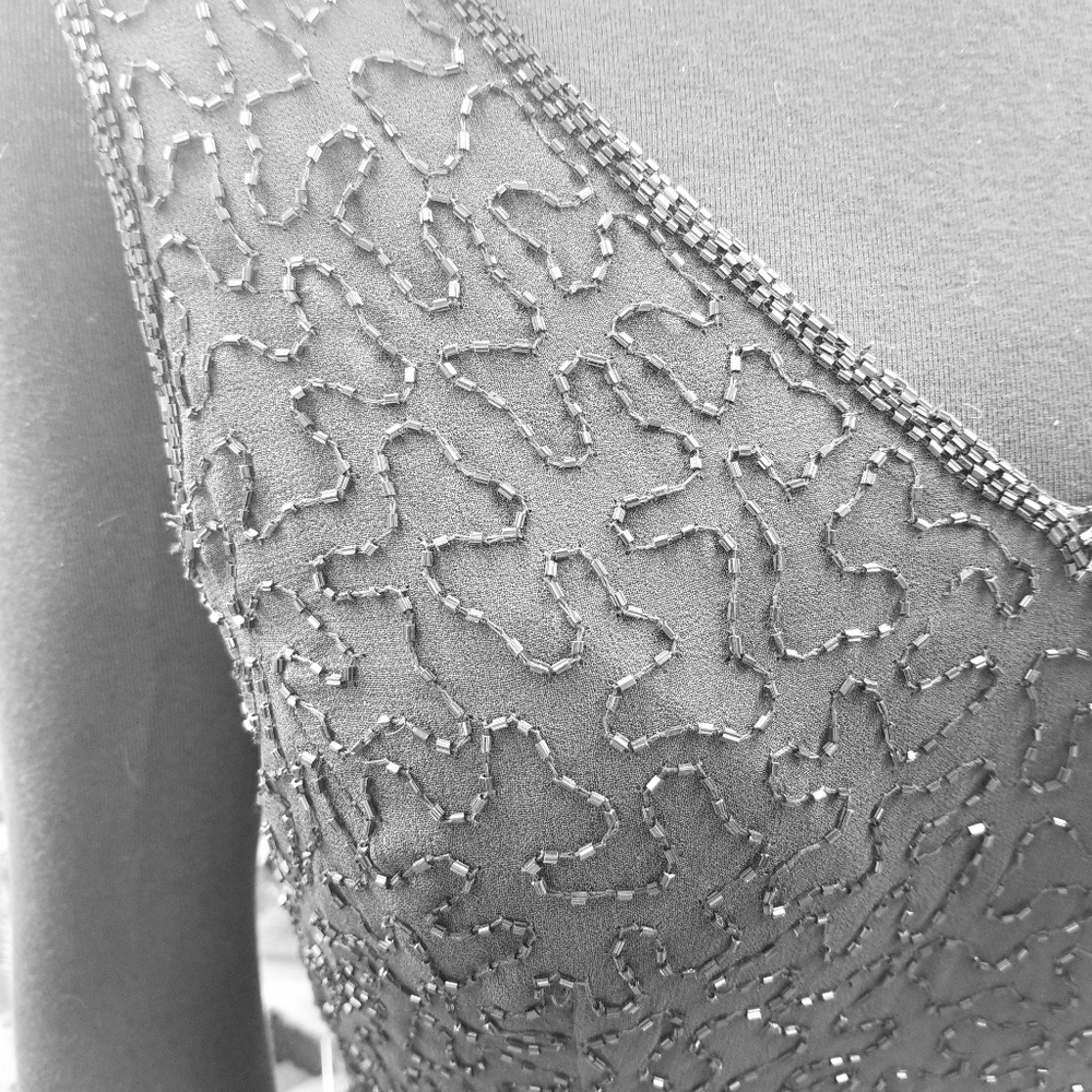 Knee-length black beaded sheath gown